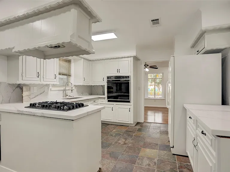 5735 Wigton Dr — Photo 4