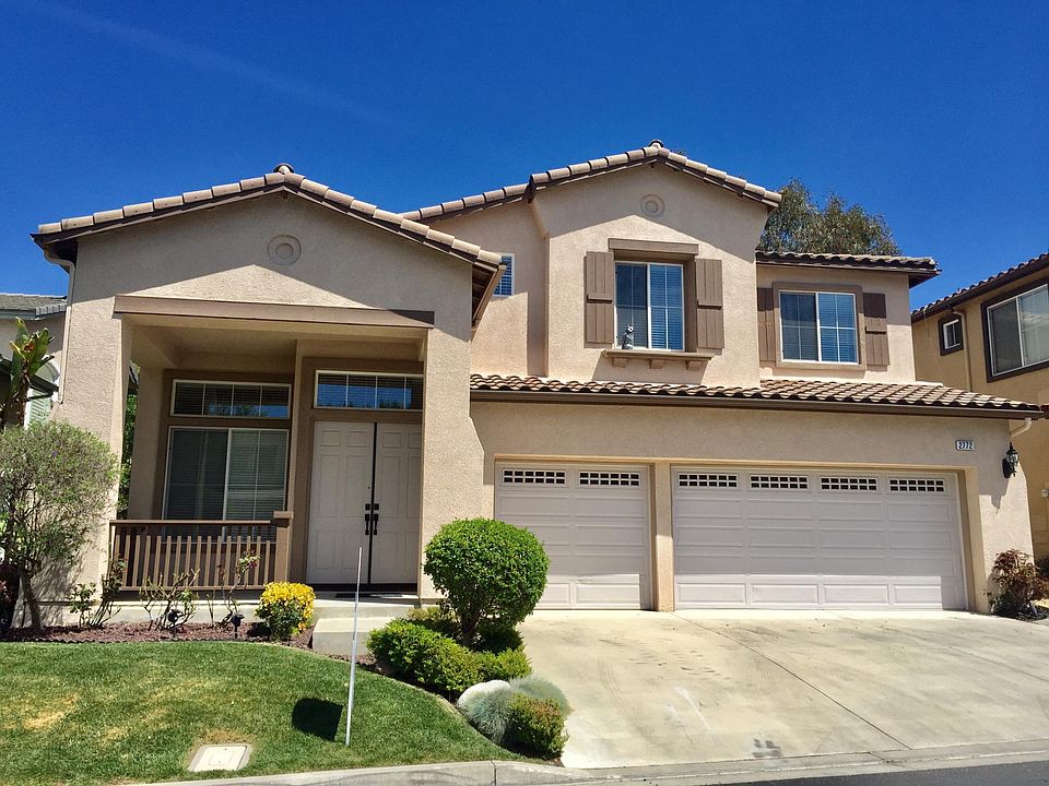 Double door entry with front Porch with 3 car garage