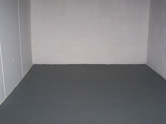 Freshly painted basement could be a rec room