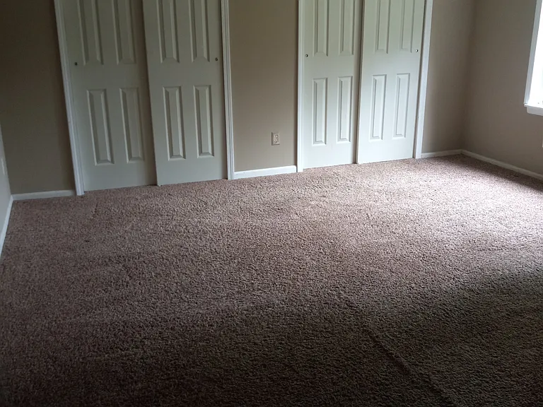 master bedroom with two closet, 13 by 18, and with its own bathroom