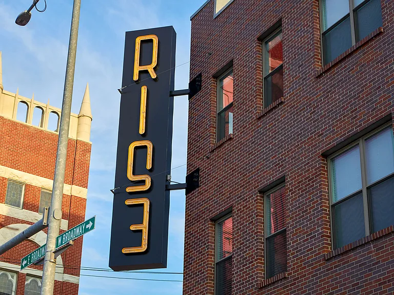 The Rise building signage.