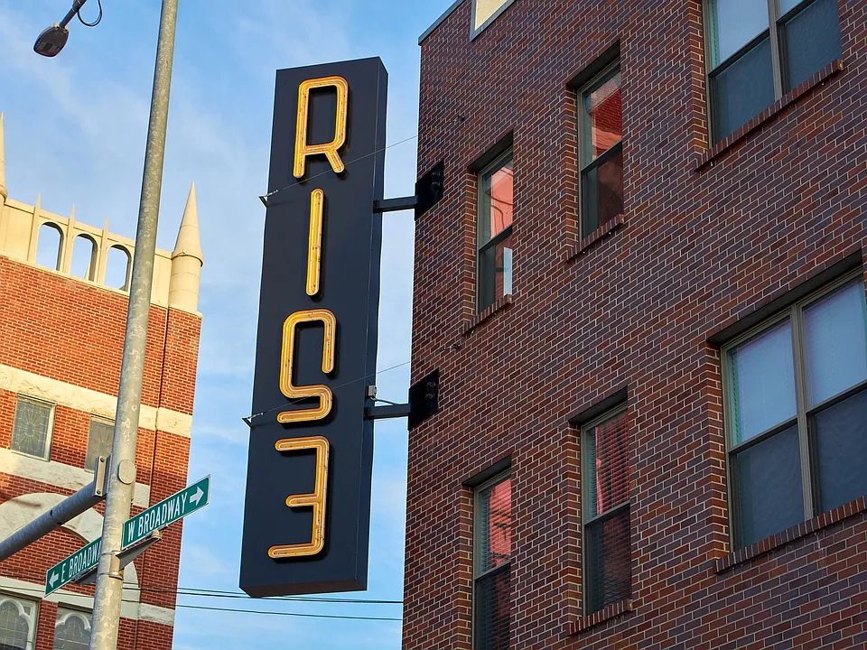 The Rise building signage.