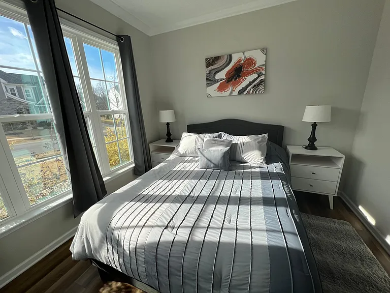 Main Floor Bedroom with walk in closet and shared bath