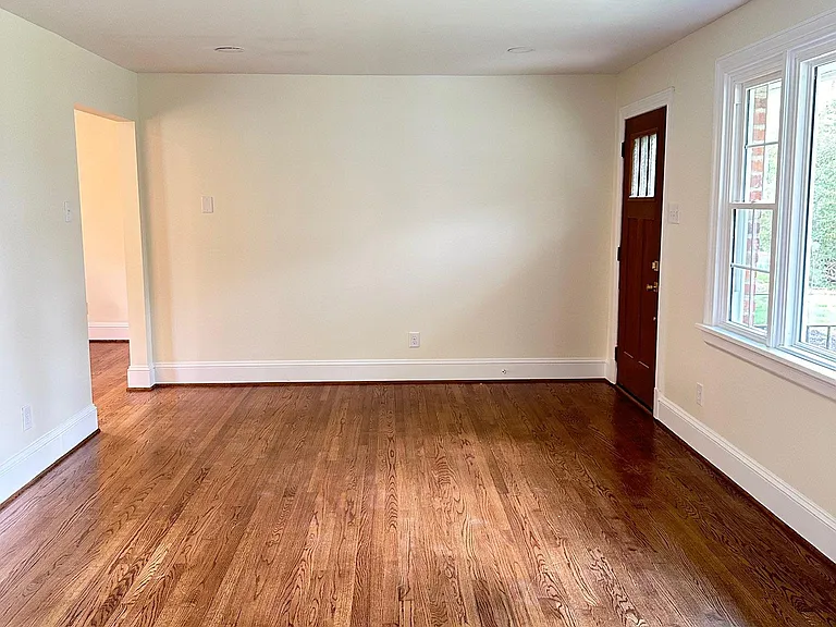 Living room with main entrance.