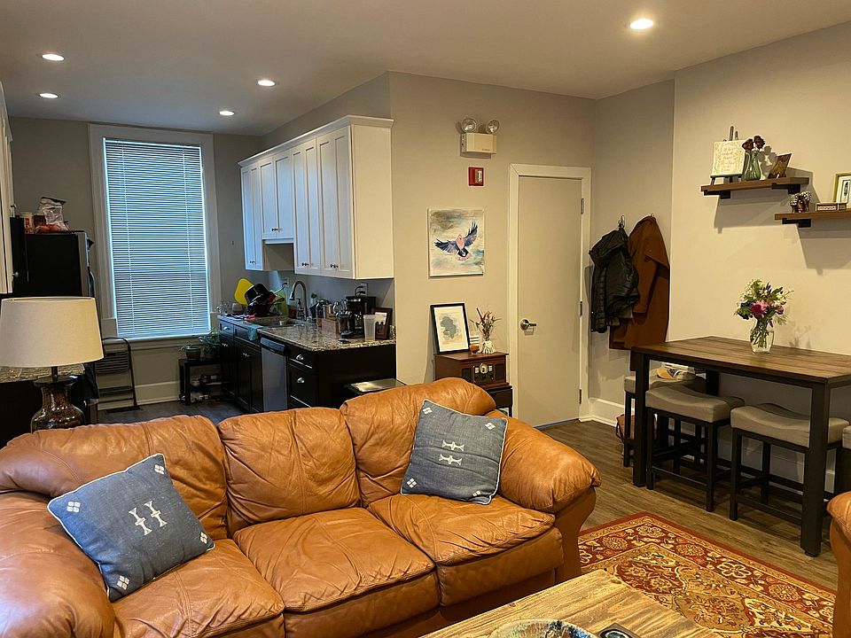 Living room/Kitchen, door leads to a full bath