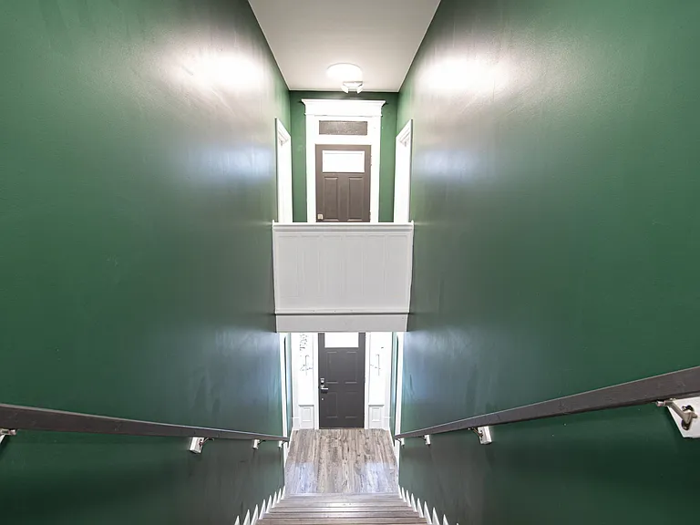 Front Door / Door to Balcony