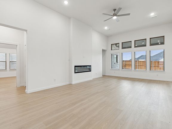 Living Room in the Gilmour II home plan by Trophy Signature Homes - REPRESENTATIVE PHOTO