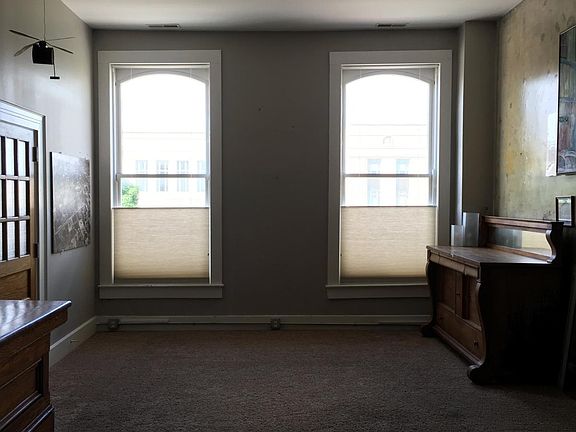 Living room, with north-facing windows over Wabash Avenue.