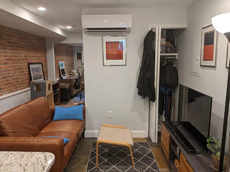living room area also has a storage closet