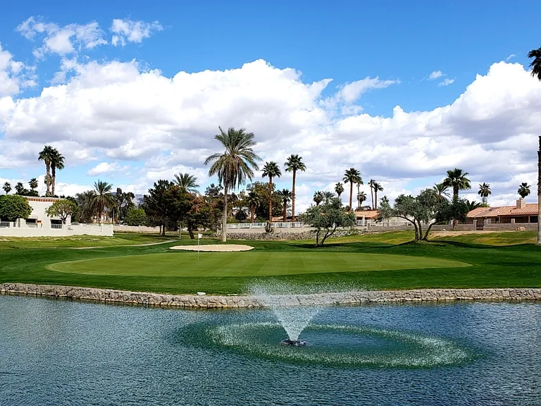 Beautiful Lake Havasu Golf Club featuring lush fairways, scenic water features, and year-round play _ located just minutes from the home.