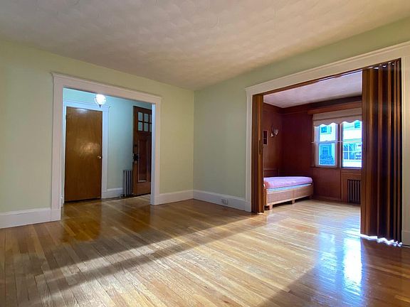 Large sunny living room, big enough for larger furniture.