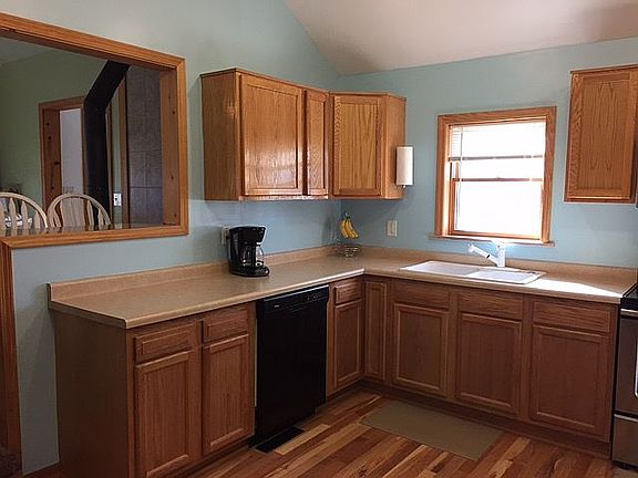 Kitchen with breakfast bar. 