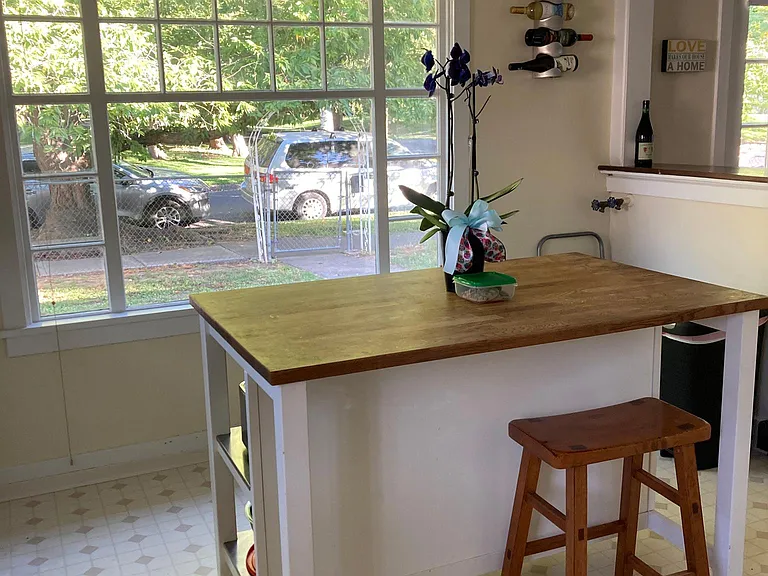 The spacious kitchen connects to the living and dining area.
