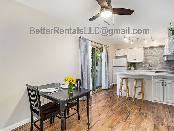 dining and kitchen with countertop bar