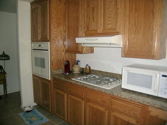 Propane cooktop/electric built-in oven