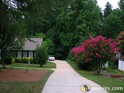 long Driveway to Garage in rear