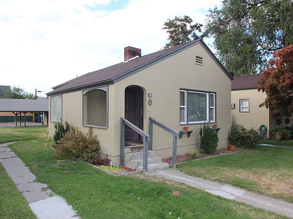 Front and side, carport in the rear