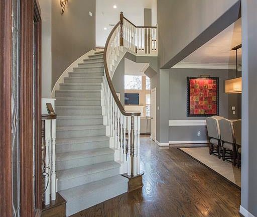 Open and inviting to your new home showcase the custom lighting.