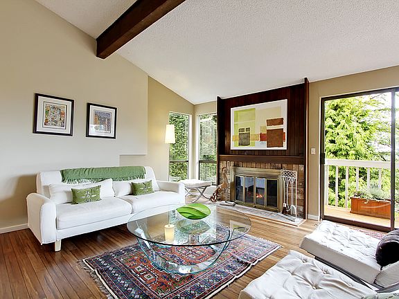 LR with fireplace and deck