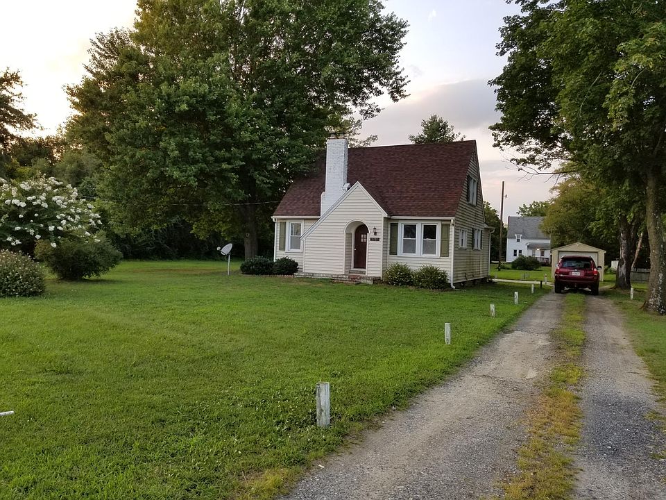 Landscaped yard with off-street parking.