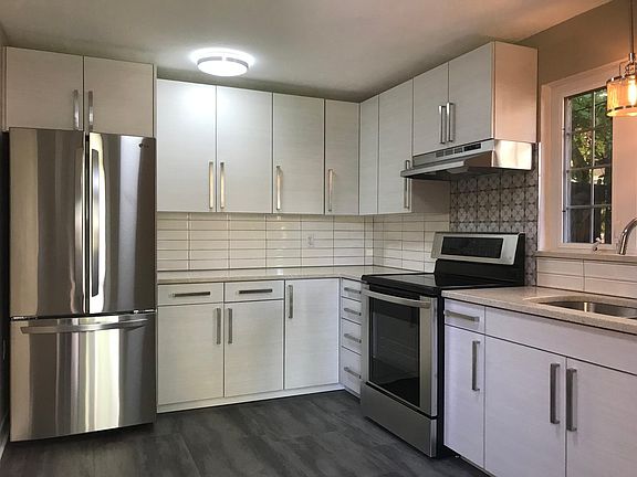 Brand new appliances, including French Door, side-by-side refrigerator with ice maker.