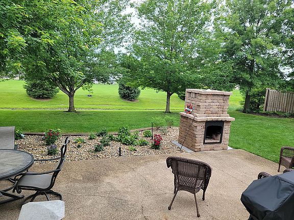 Patio with fireplace