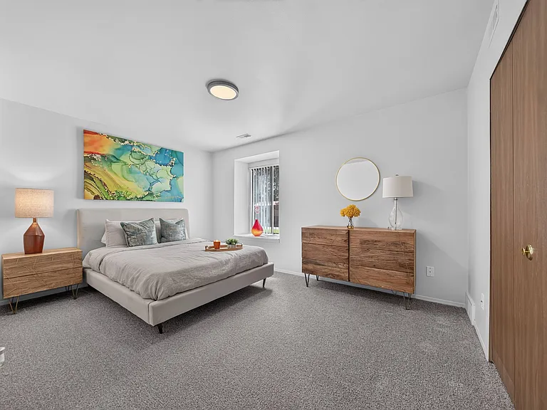 Spacious Bedroom at Lakeside Village Apartments in Clinton Township, MI.