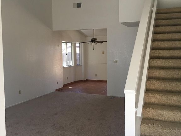 living room and stairs to master bedrm