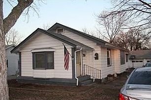 Exterior Front. Room to plant flowers or bushes...