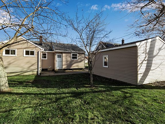 Partially fenced in back yard.