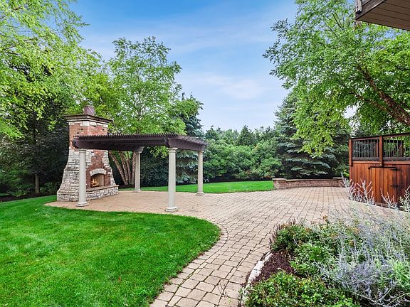 Brick Patios, artist designed the Fireplace & Arbor