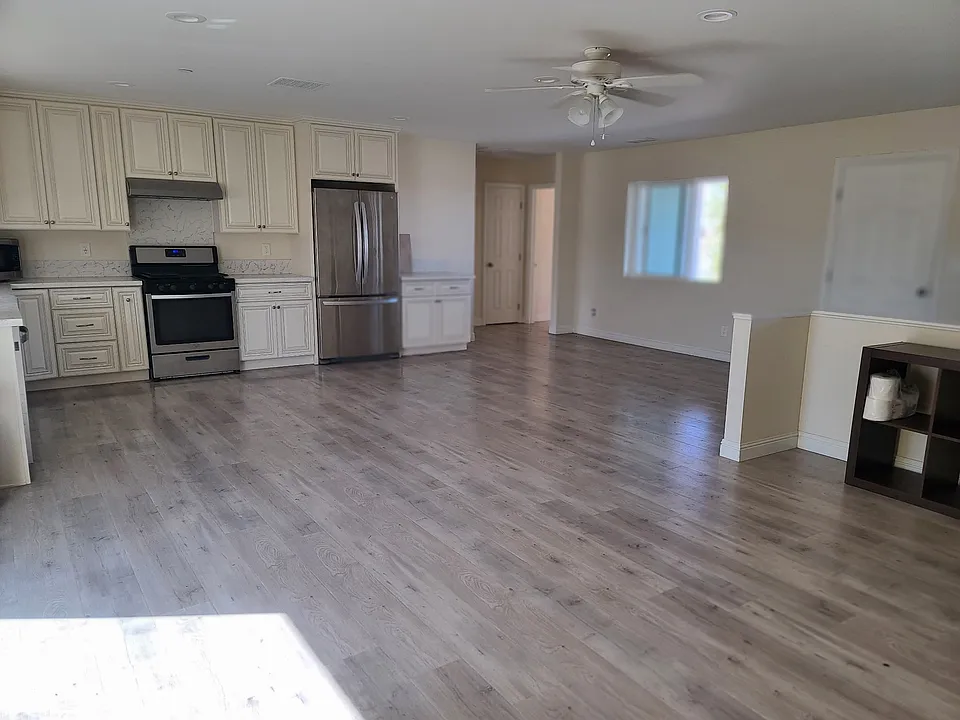 Open concept kitchen and living room space