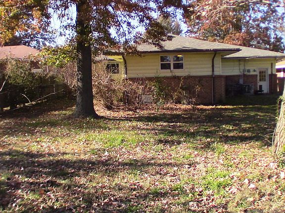 Backyard looking to house