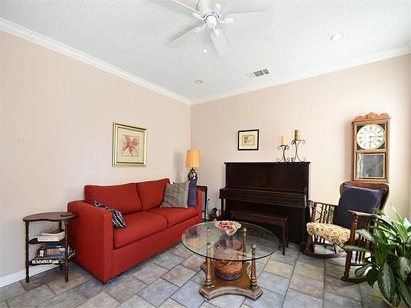 High ceilings, crown molding and tile flooring.