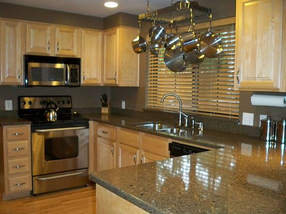 Stainless appliances, undermount double sinks, Silestone counters