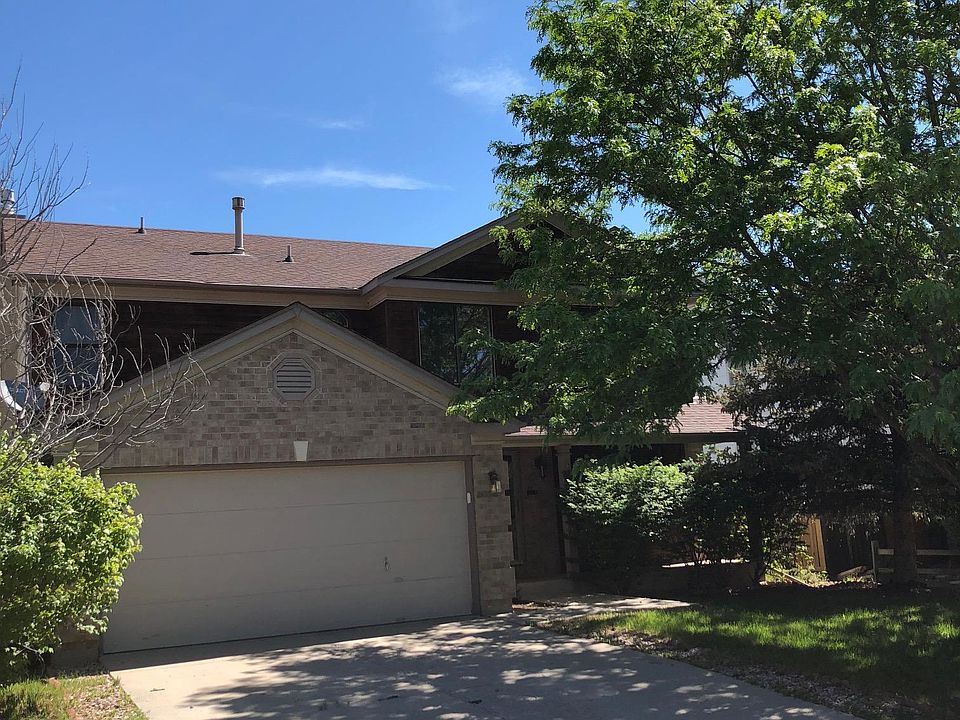Shady front exterior with front patio