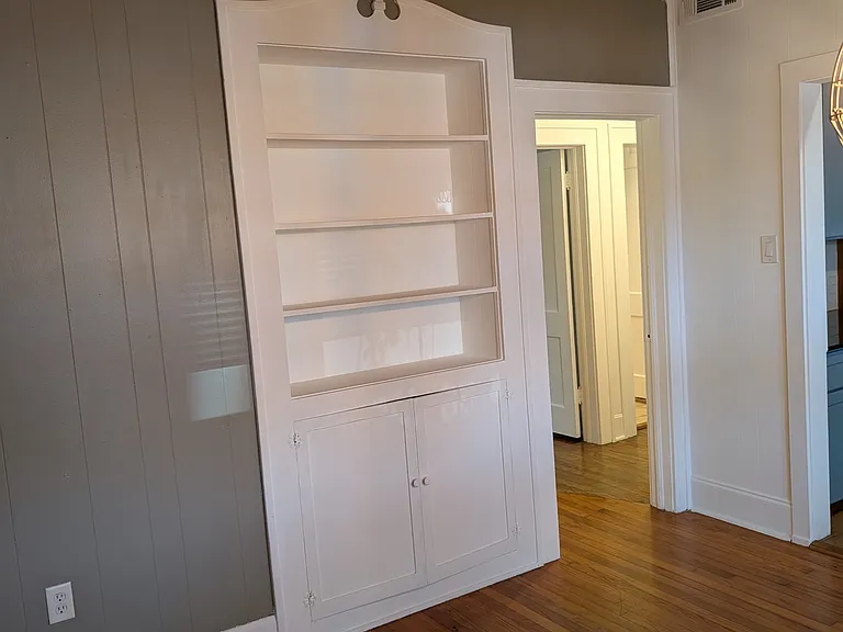 Dining Room built in cabinet and view of hall