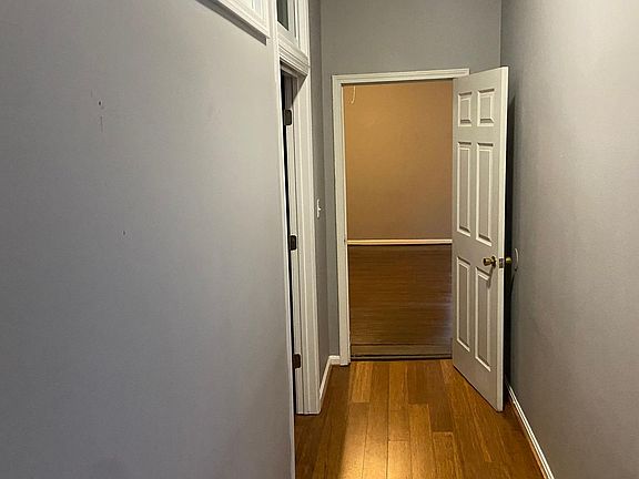 hall leading to 2nd bedroom and family room