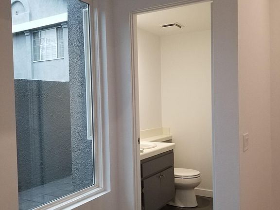 Powder Room next to Front Entry and Living Room