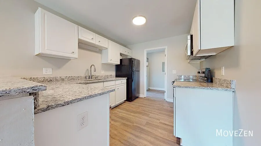1076 Norris Rd Clayton NC 27520 Wood-Look flooring, Private Balcony, Modern Updates — Photo 3