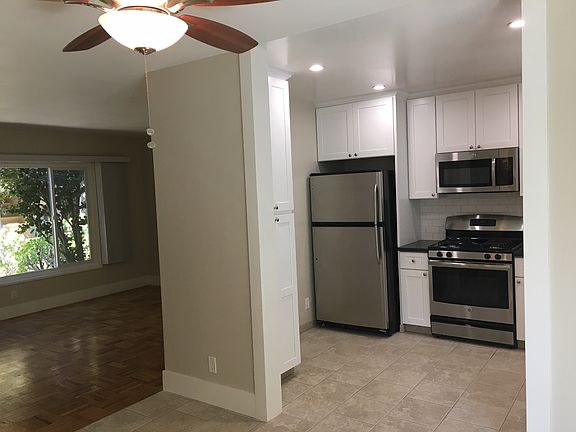 Dining area view of kitchen & living area