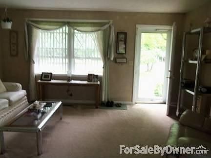Living room area
						:
						Faux textured walls make this living area, cozy, comfortable & a quiet retreat!