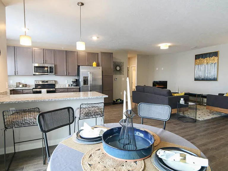 Our open-concept living and dining spaces are designed for modern living, with high-end finishes and thoughtful details.