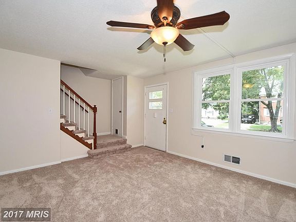 Living Room views w/stairway to upper level
