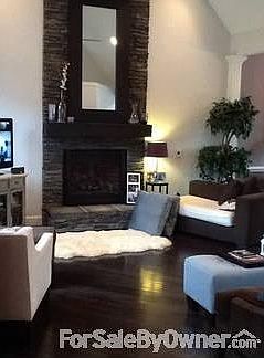 living room
						:
						living room with stone fireplace