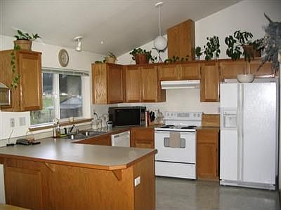Kitchen has been painted all appliances are all stainless steel with black.