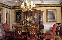 Formal dining room with coffered ceiling and convenient butlers pantry. 