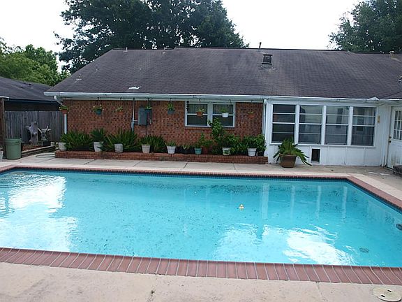 Sparkling pool in the fenced backyard!