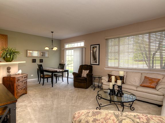 Large Windows Lets The Sun Shine In With Custom Blinds