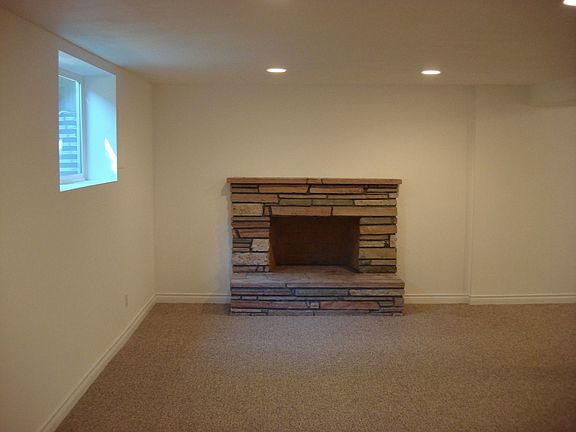 Fully finished basement w/ fireplace and laundry room. New washer/Dryer stay 